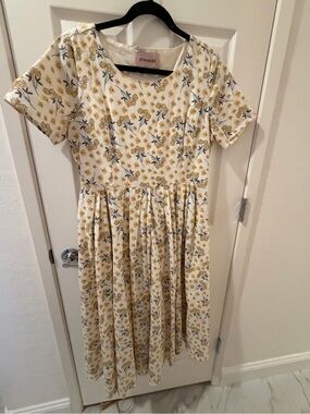 JessaKae Cream Dress with Yellow Floral Pattern and Blue Leaf Accents